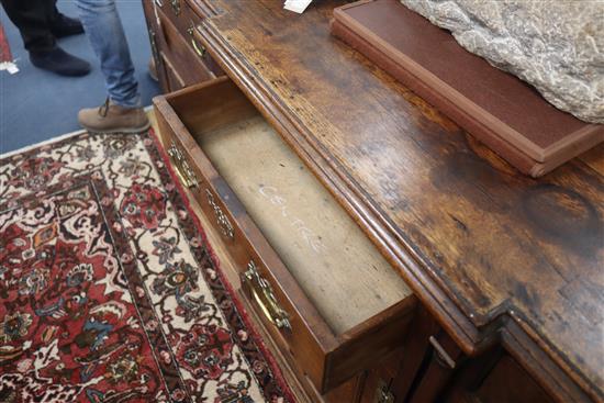 An early 19th century oak breakfront dresser base W.184cm